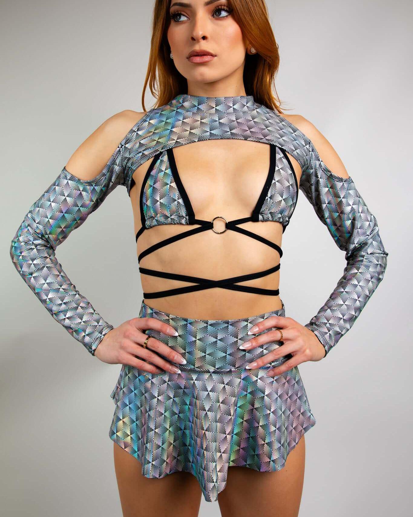 Model showcasing Prism Spectra Sleeves, a radiant addition to rave outfits with a futuristic design and shoulder cutouts.