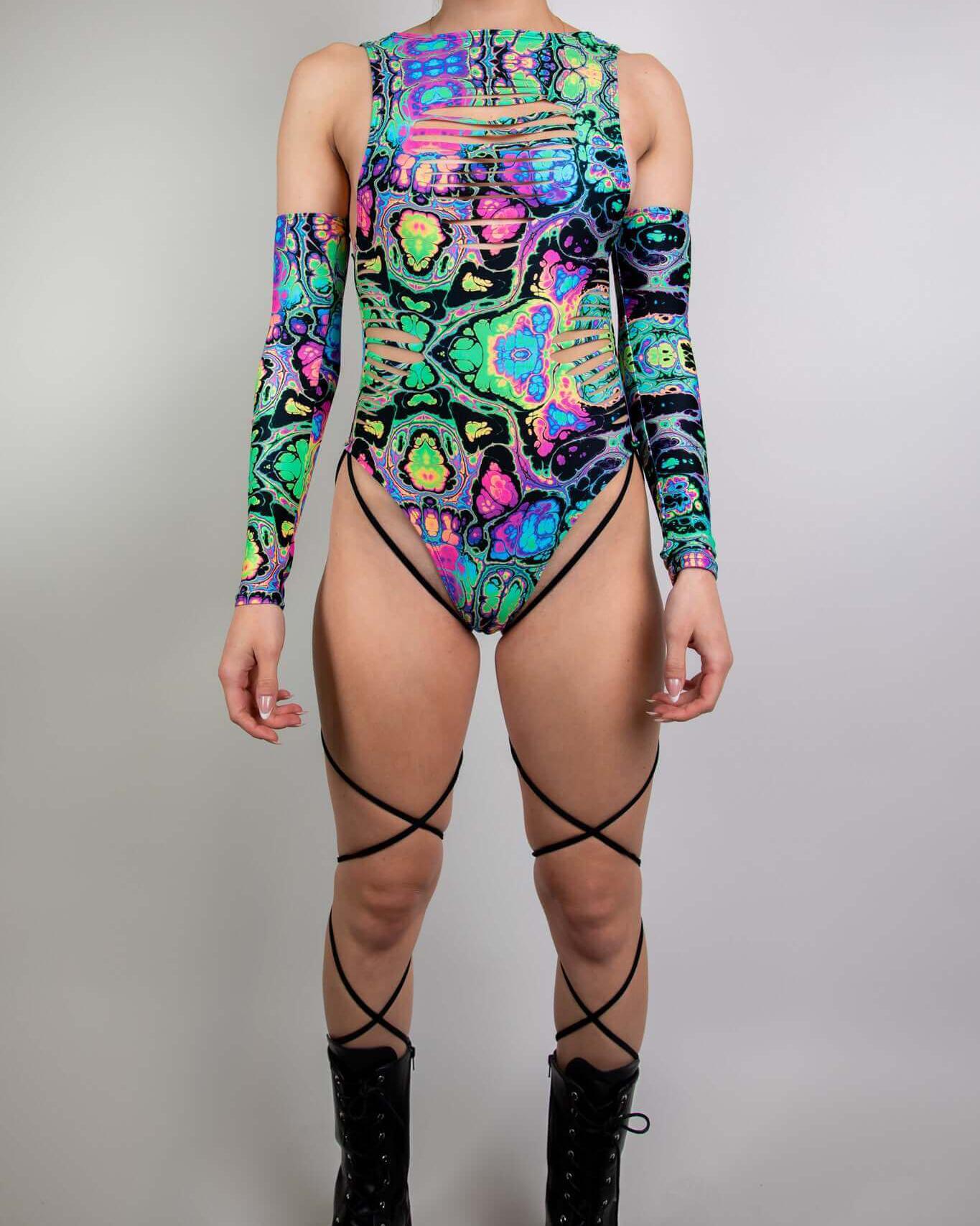 Vibrant prismatic slit sideboob bodysuit with leg straps, perfect for rave outfits and dancing the night away.