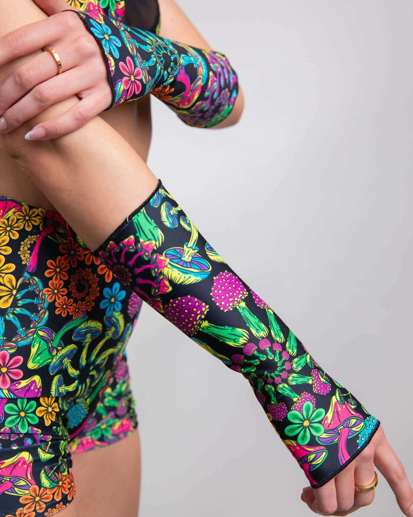 Colorful PsyBloom Gloves with floral designs, perfect for rave outfits, showcasing a vibrant, magical aesthetic.