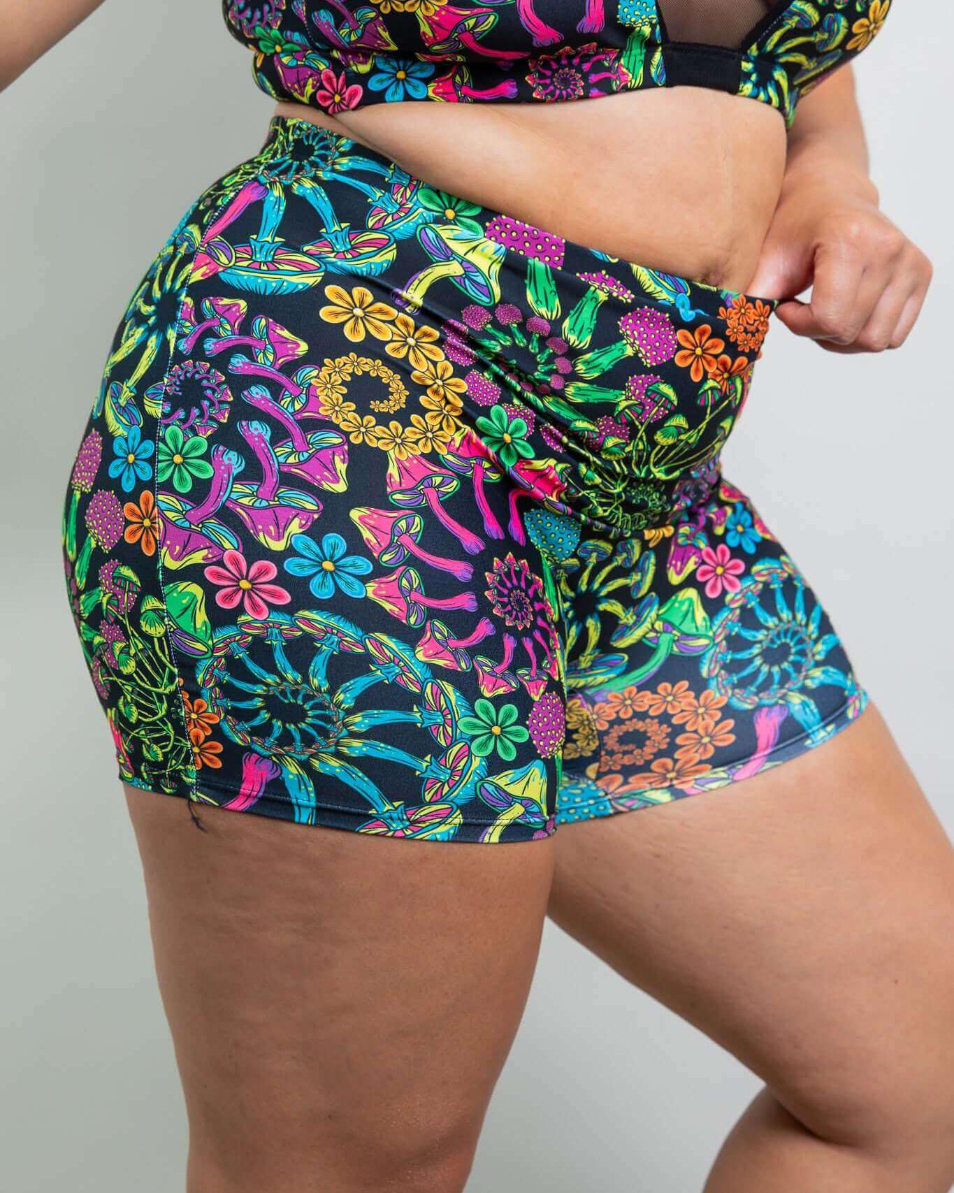 PsyBloom High Waist Shorts featuring vibrant floral patterns, ideal for rave outfits and comfortable movement.