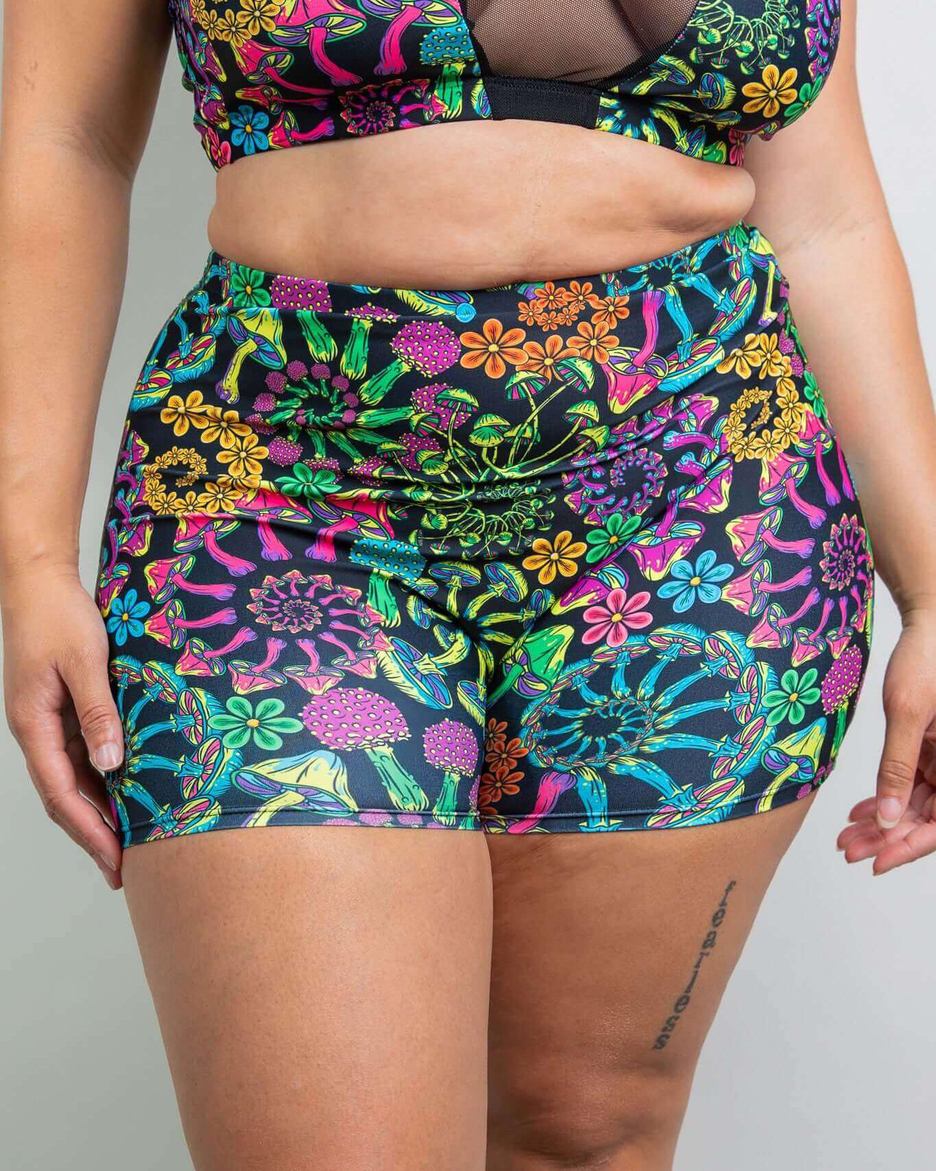 PsyBloom High Waist Shorts in vibrant floral and mushroom print, perfect for stylish rave outfits.