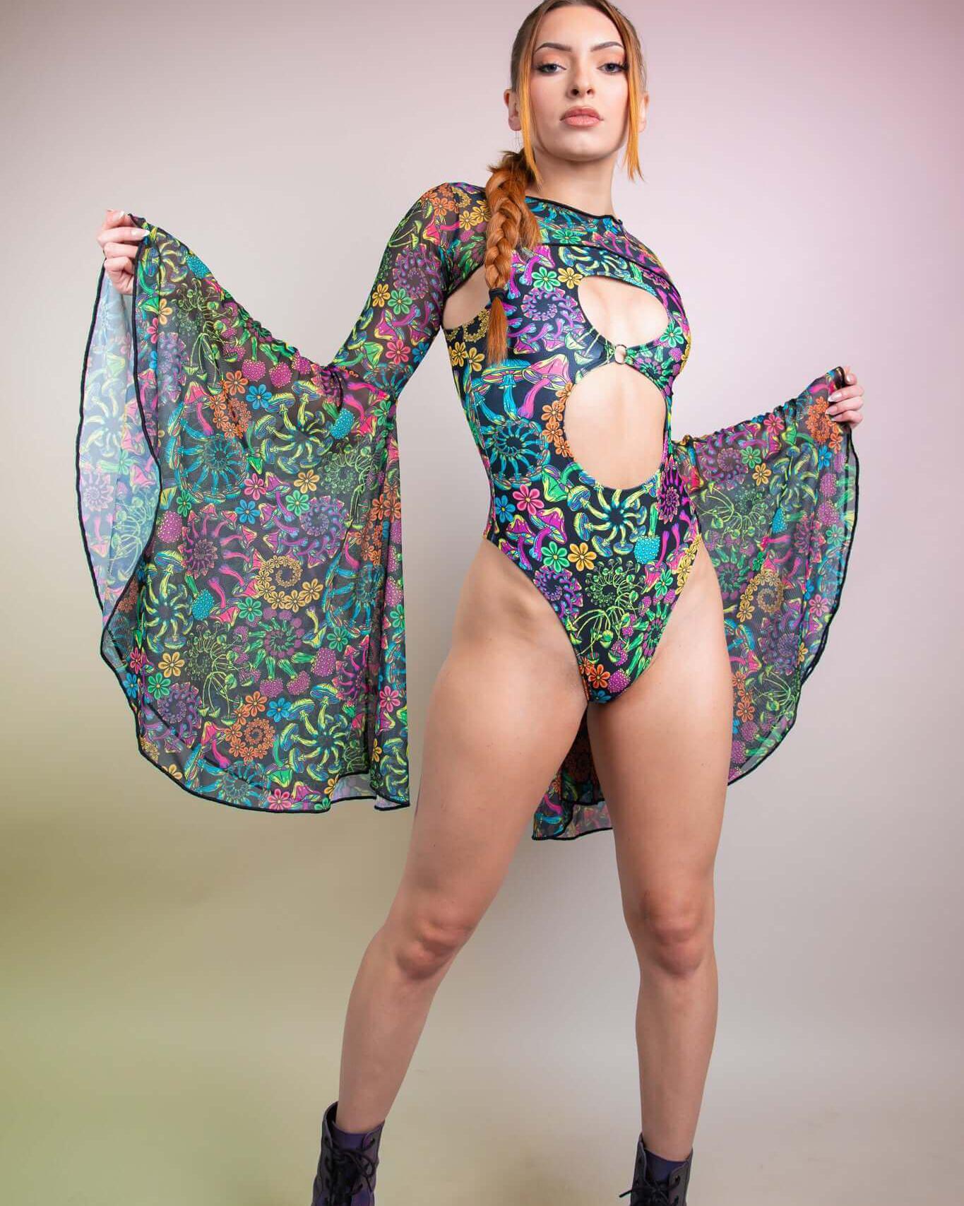 Model showcasing PsyBloom Mesh Bell Sleeves with colorful floral bodysuit, perfect for rave outfits and festival looks.