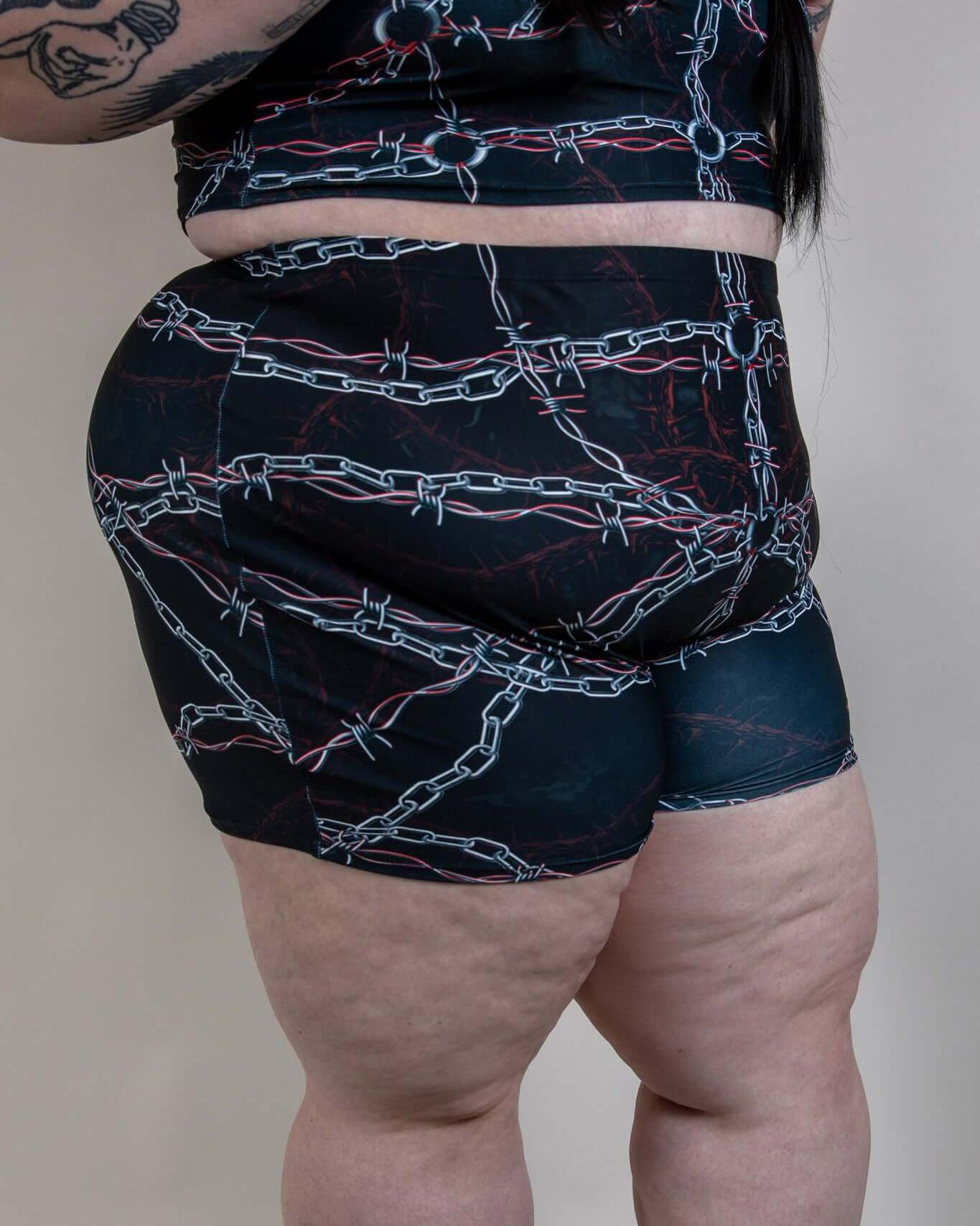 Purgatory High Waist Shorts featuring barbed wire design, perfect for rave outfits, offering comfort and full coverage.