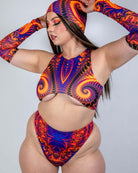 Model showcasing vibrant Radiance Collection outfit with psychedelic print, perfect for rave outfits.