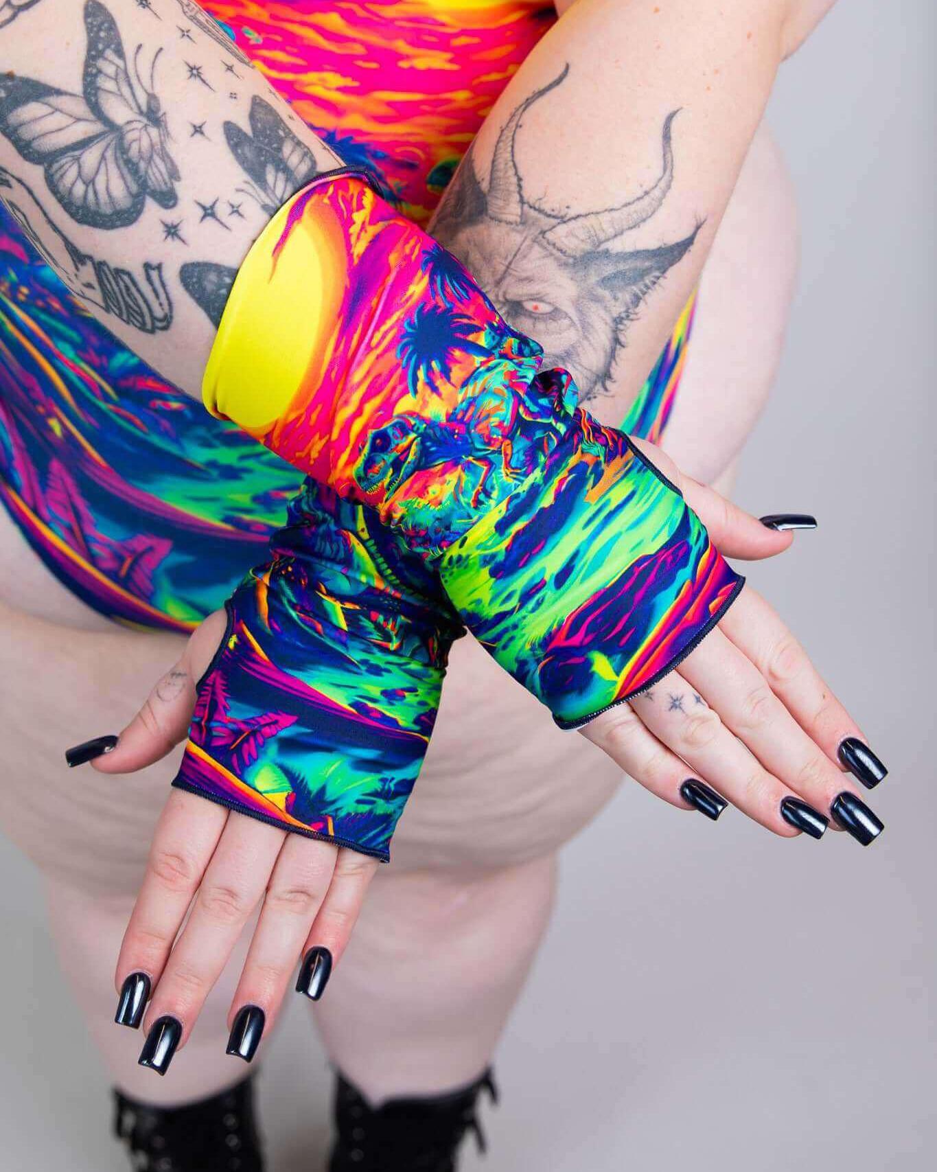 Raptor Gloves featuring a vibrant design, perfect for rave outfits, showcasing a colorful, playful style on a model.