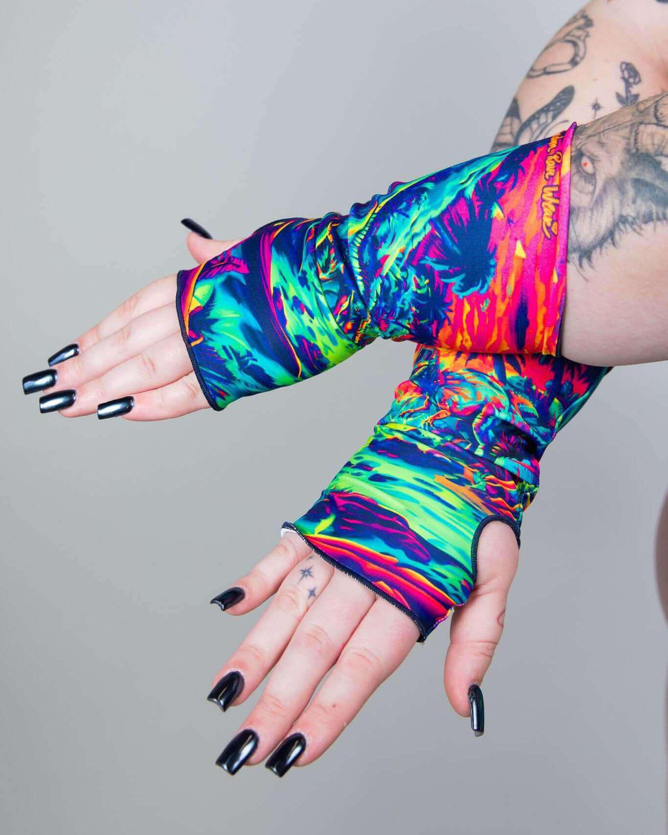 Colorful Raptor Gloves designed for rave outfits, featuring thumb holes and a comfortable forearm fit.