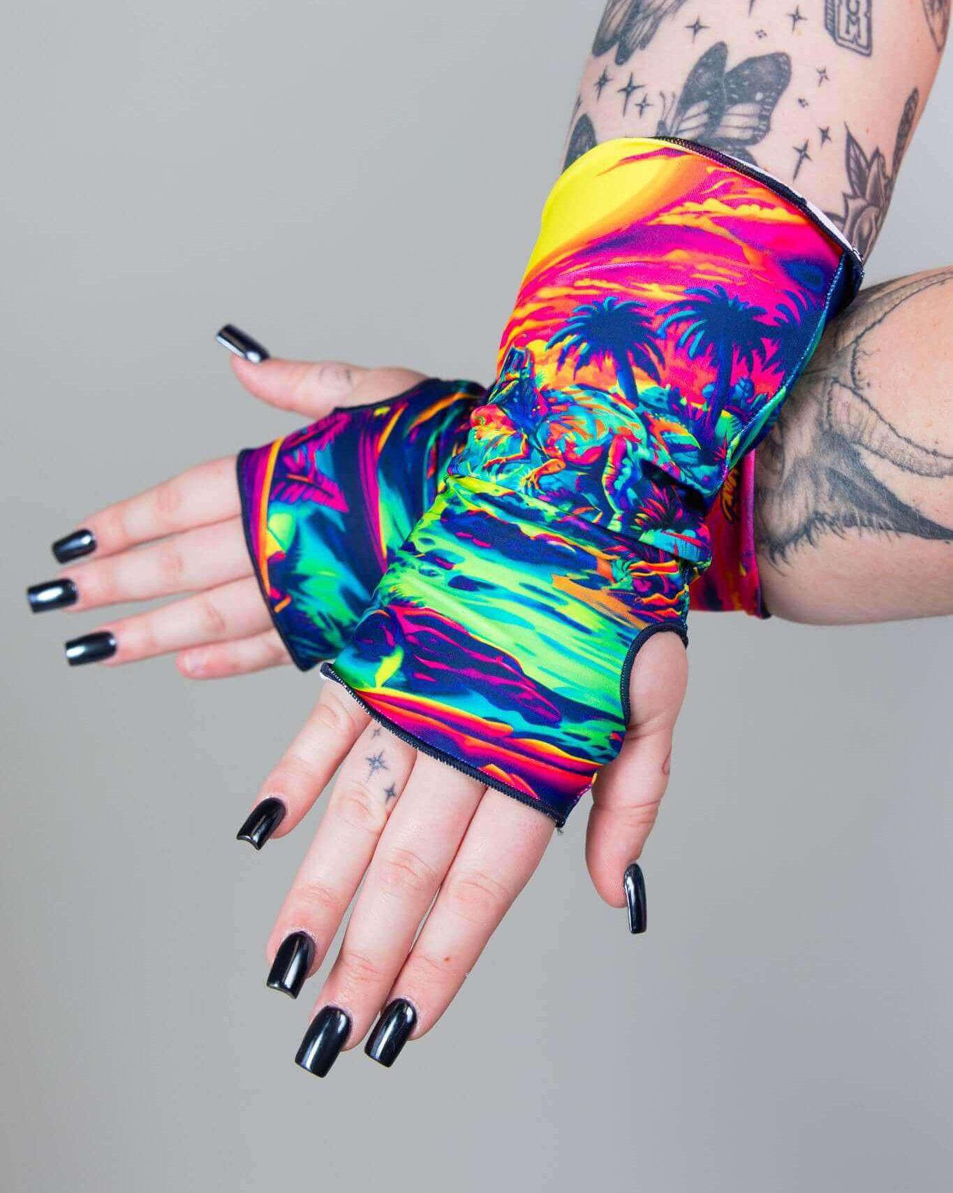 Colorful Raptor Gloves with palm cutouts, perfect for rave outfits and showcasing playful style.