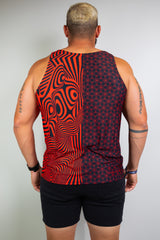  Model displaying back view of a black and red geometric tank top with bold patterns, ideal for raves. Freedom Rave Wear provides unique fashion.