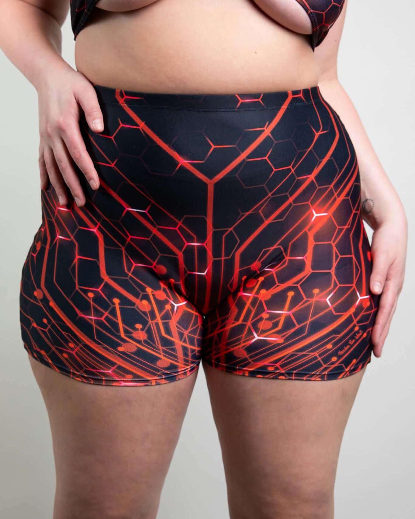 Red Singularity High Waist Shorts featuring a seamless front and vibrant rave-inspired design, perfect for rave outfits.