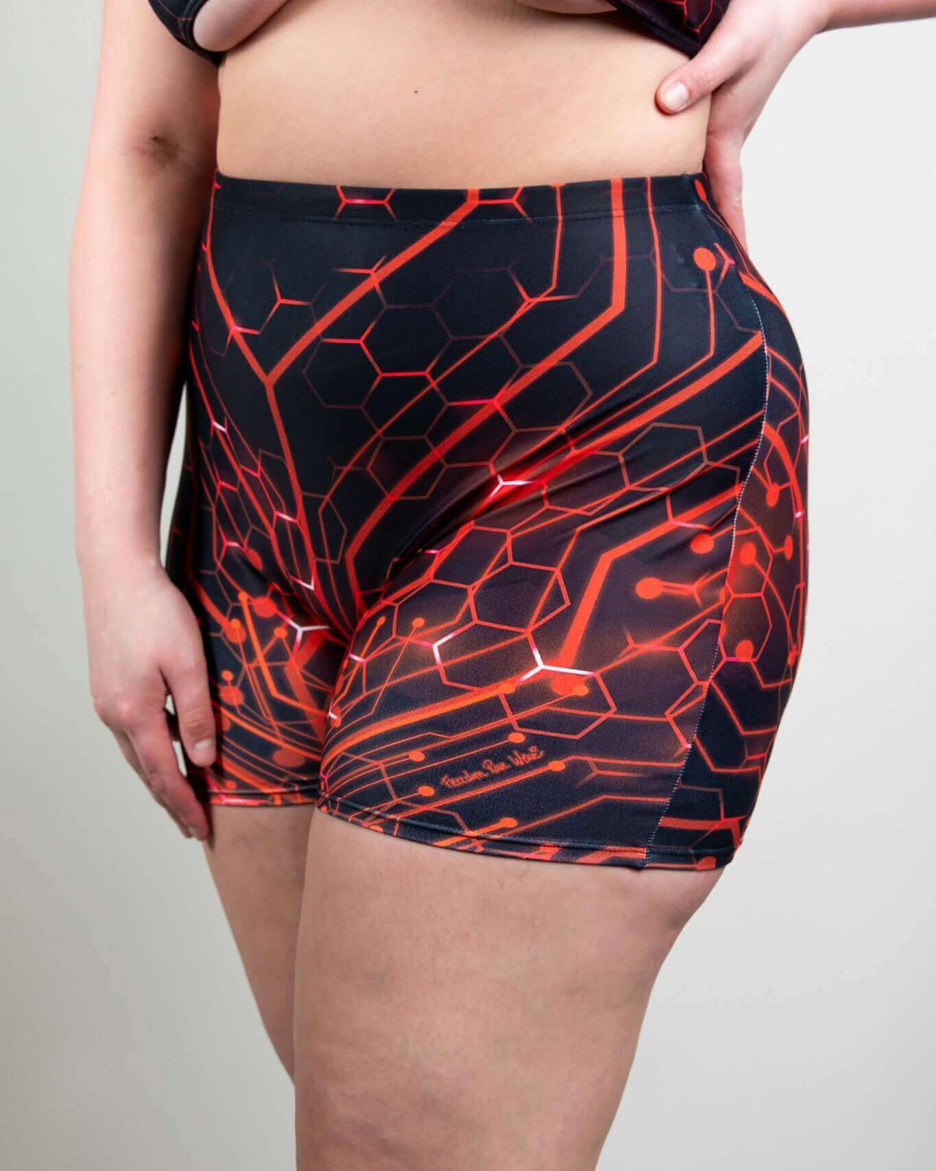 Red Singularity High Waist Shorts showcasing a bold circuit pattern, perfect for rave outfits and festival wear.