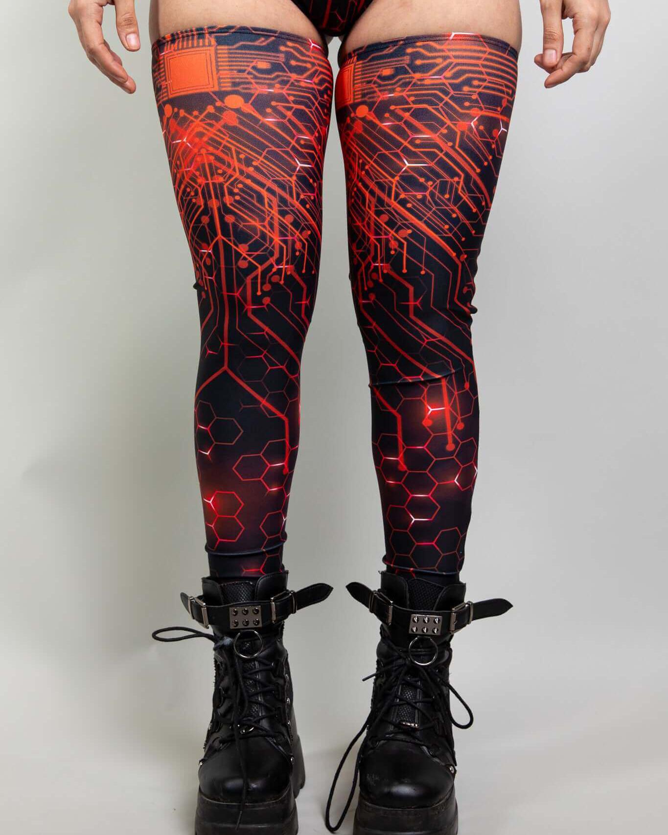 Red Singularity Leg Sleeves featuring a bold circuit design, perfect for rave outfits and stylish performances.