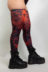 Freedom Rave Wear's circuit-themed leggings featuring vivid red and black patterns, perfect for rave enthusiasts
