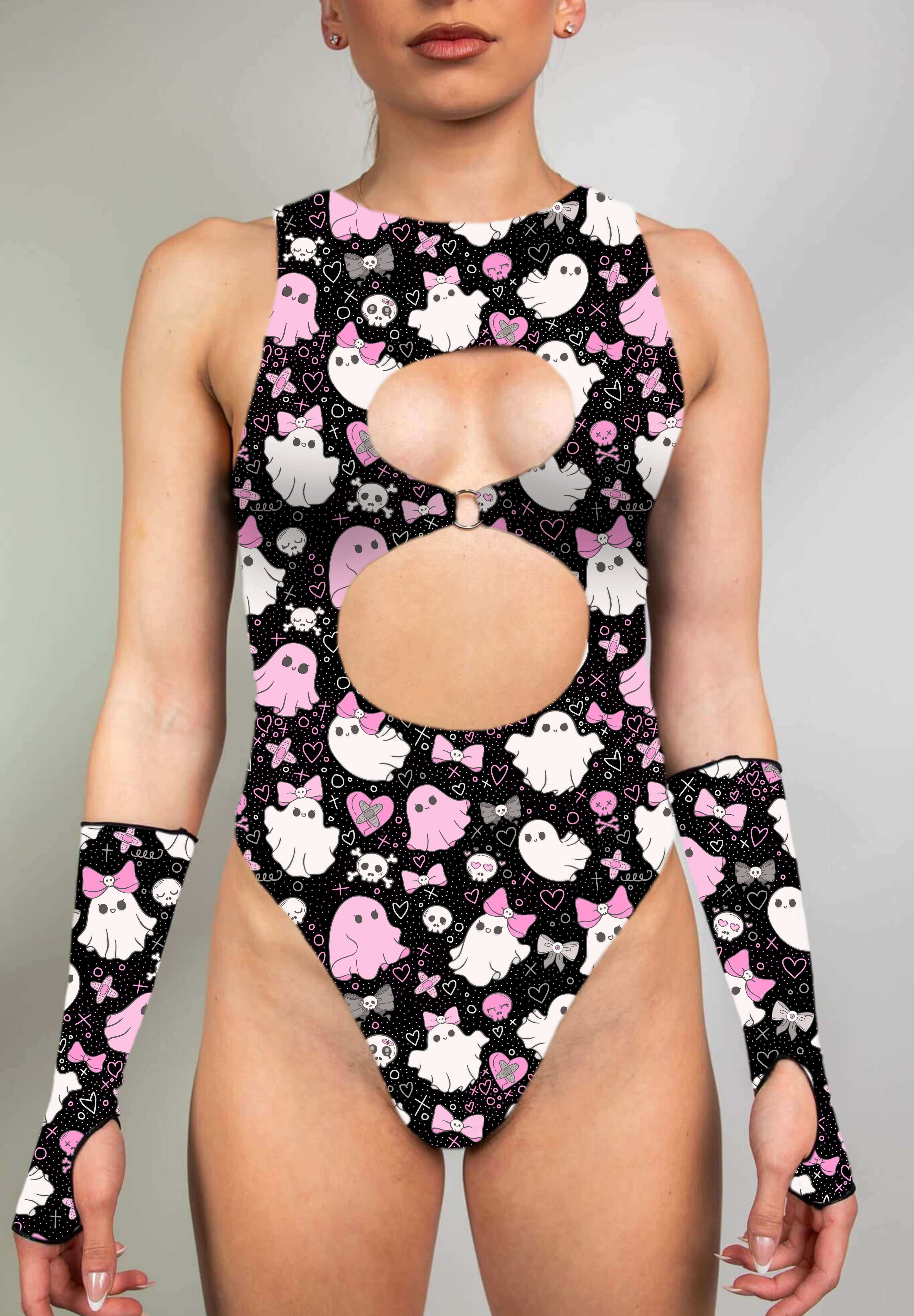 Model wearing keyhole bodysuit with pink and white spooky ghost print and matching gloves.