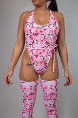 Sakura Temptation Cheeky One Piece in pink cherry blossom design, perfect for rave outfits and spring events.