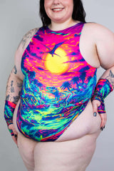 Model wearing colorful Saurian High Neck Bodysuit with vibrant dinosaur and sunset print, perfect for rave outfits.