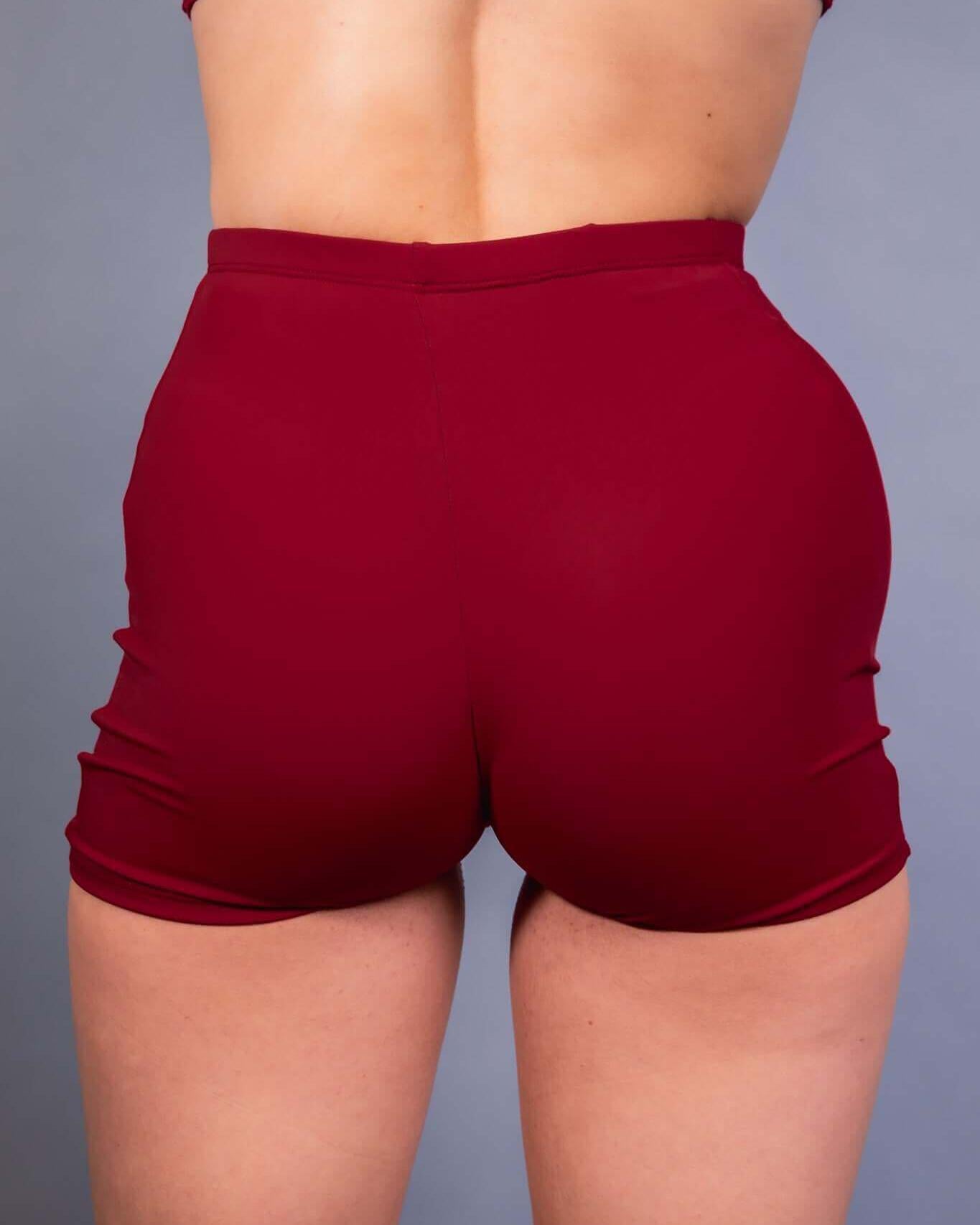 Back view of Scarlet High Waist Shorts showcasing high-waisted design, comfortable fit, and chic style for rave outfits.