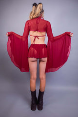 Rear view of Freedom Rave Wear's scarlet festival outfit with flowing mesh bell sleeves, showcasing a unique rave style.