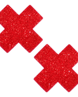 Sparkly red glitter X factor nipple cover pasties for rave outfits and parties.