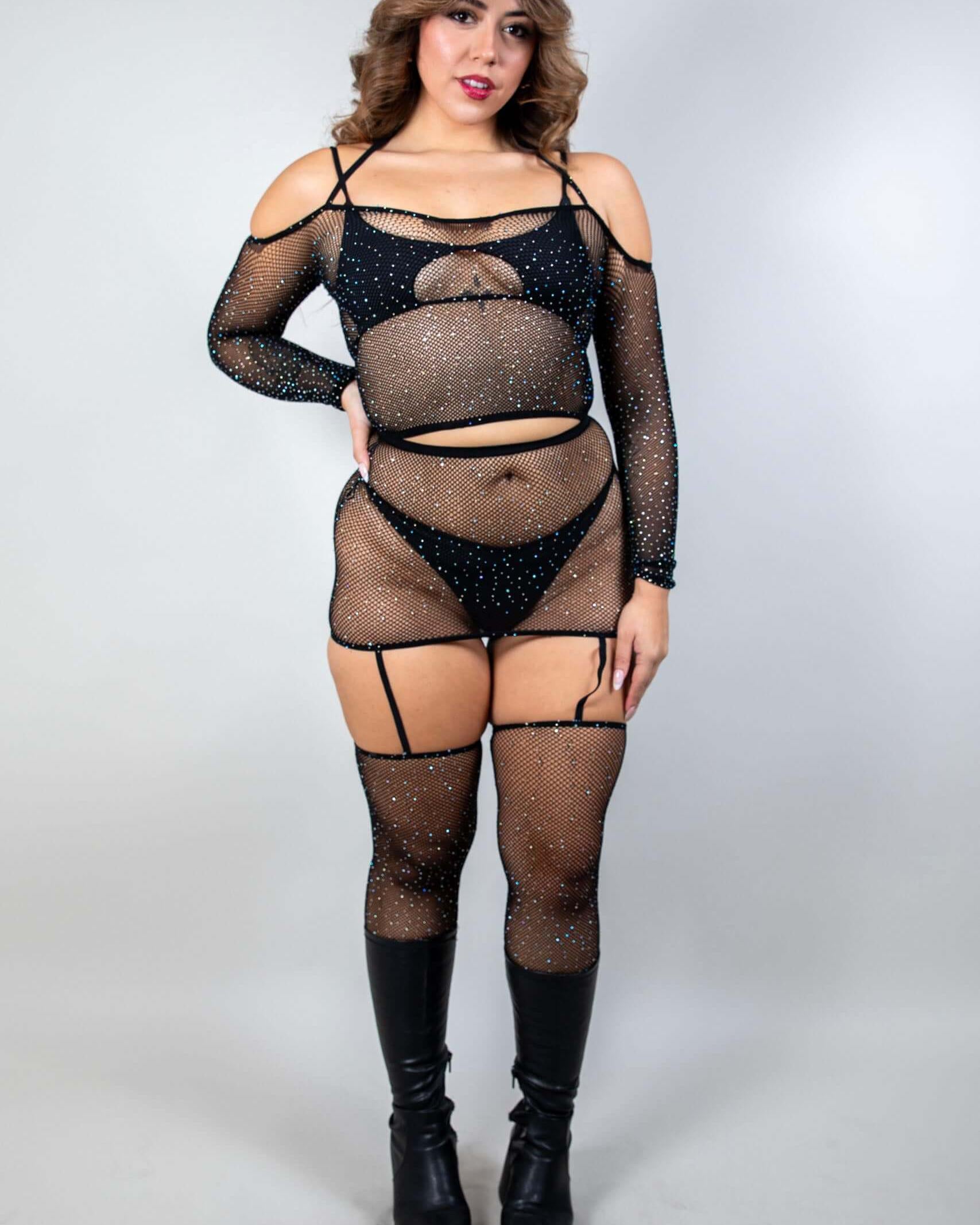 Seductra Rhinestone 2 Piece Fishnet Set featuring off-the-shoulder top, matching skirt, and attached leg sleeves in black.