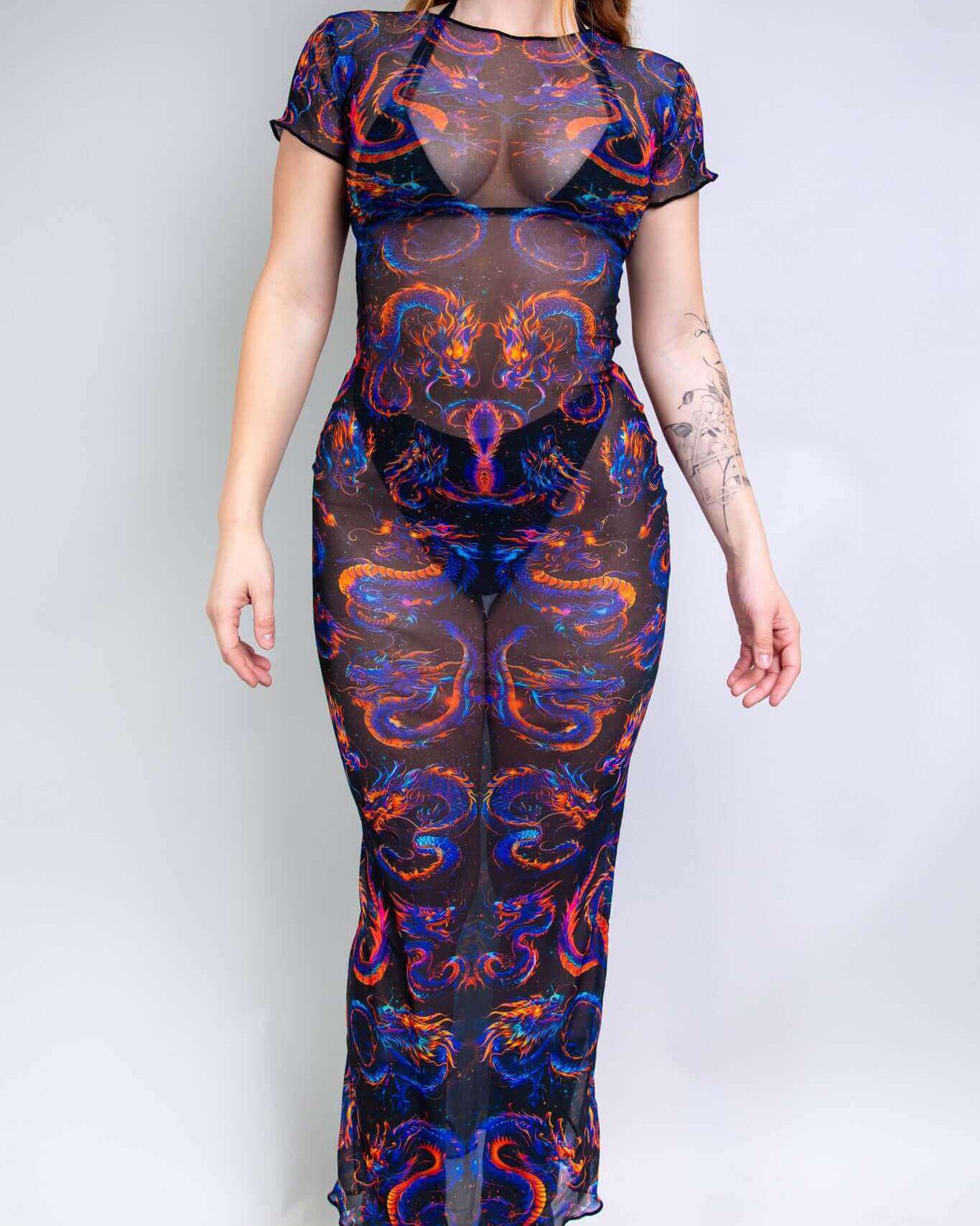 Model wearing a vibrant Shadowflame Mesh Baby Tee Maxi Dress, perfect for rave outfits and nightlife events.