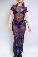 Model wearing a vibrant Shadowflame Mesh Baby Tee Maxi Dress, perfect for rave outfits and nightlife events.