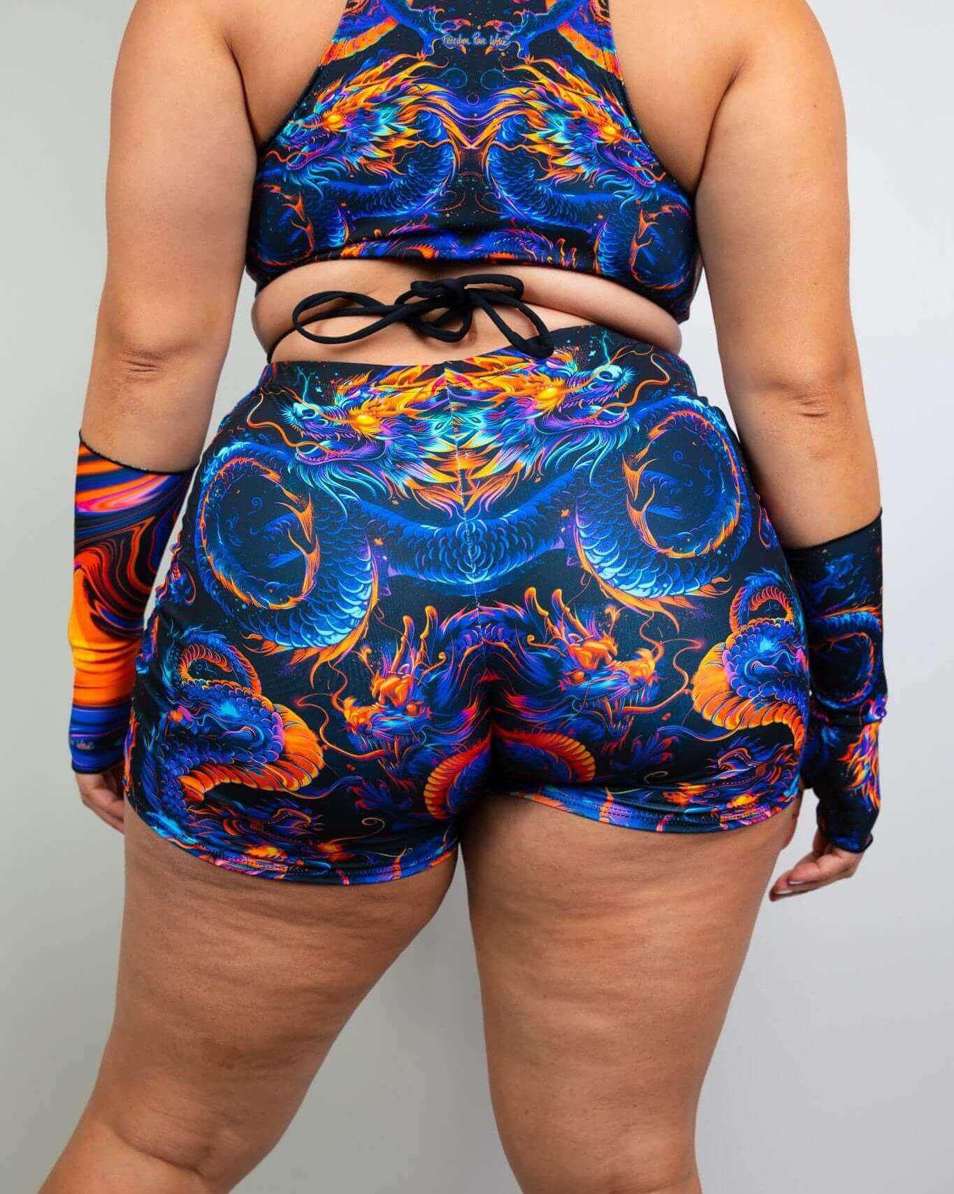 Model wearing ShadowFlame High Waist Shorts showcasing colorful rave outfit with seamless design and full coverage.