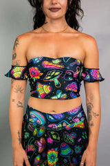 Shroomie Bardot top with colorful mushroom print, off-the-shoulder ruffles, perfect for rave outfits and playful styles.