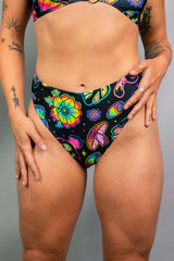 Shroomie! High Waisted Thong with vibrant mushroom and floral patterns, perfect for rave outfits and festivals.