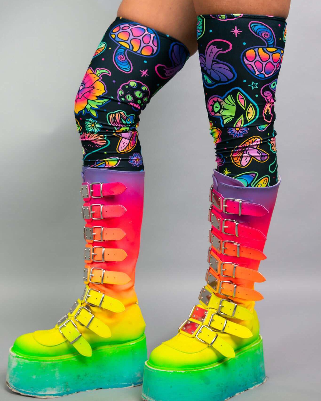 Colorful Shroomie! Leg Sleeves paired with vibrant rainbow platform boots, perfect for rave outfits and festival style.