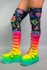 Side view of Freedom Rave Wear set with detailed psychedelic leg wraps and eye-catching ombré platform boots, featuring buckle accents.