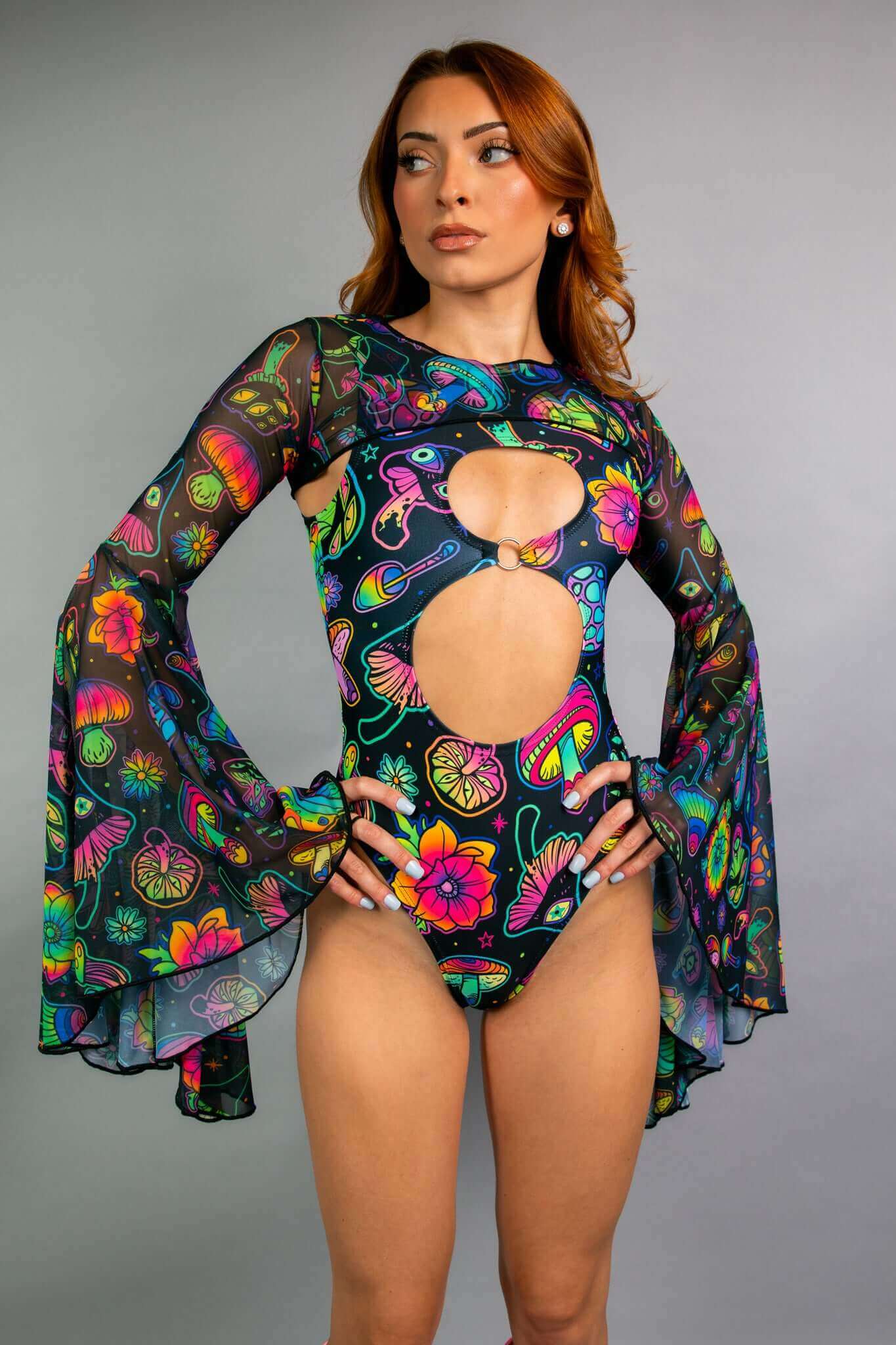 Freedom Rave Wear bodysuit with psychedelic mushroom print, bell sleeves, and a front cut-out. Ideal for a bold, festival-ready look.