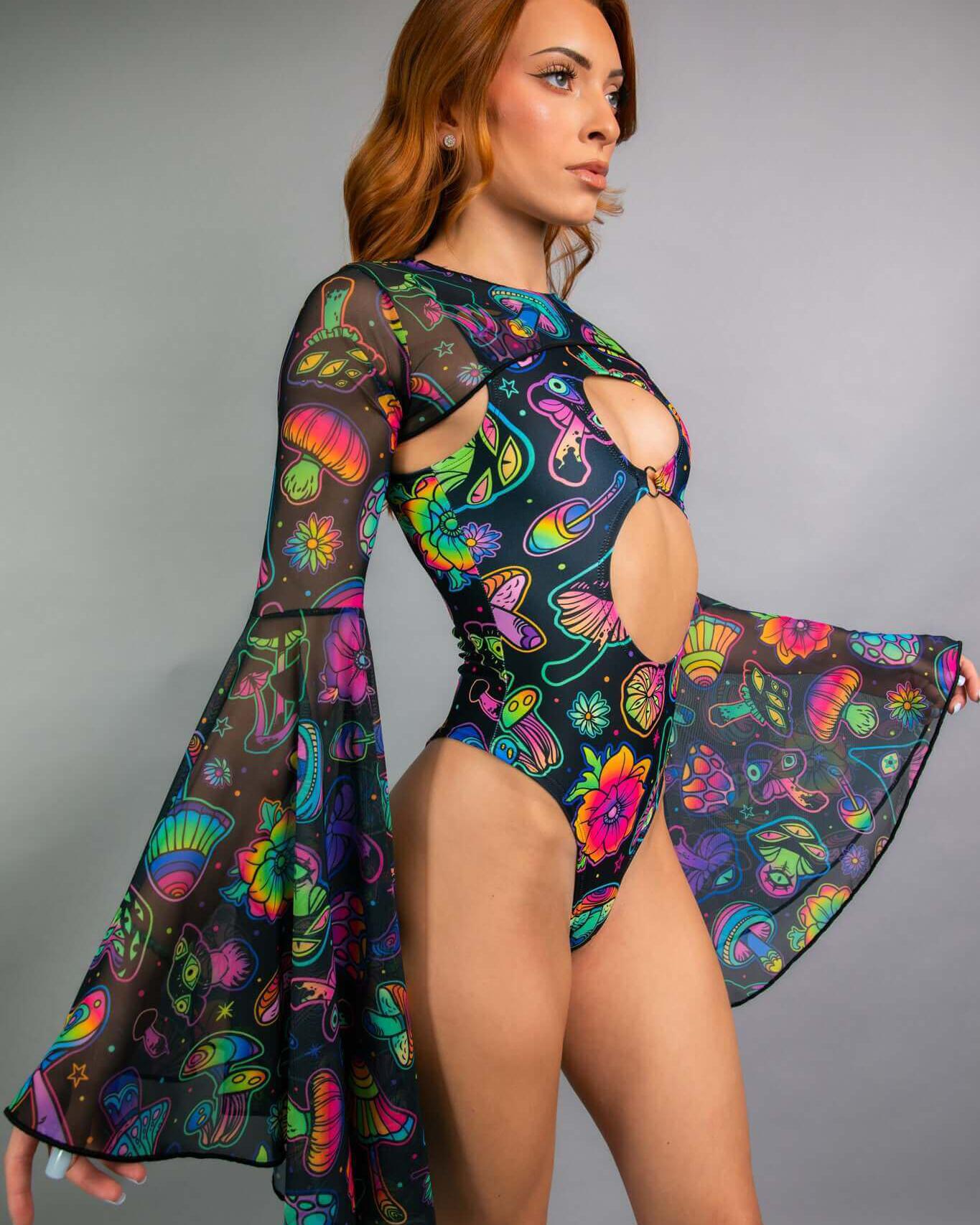 Model wearing Shroomie! Mesh Bell Sleeves with vibrant psychedelic colors, perfect for rave outfits.