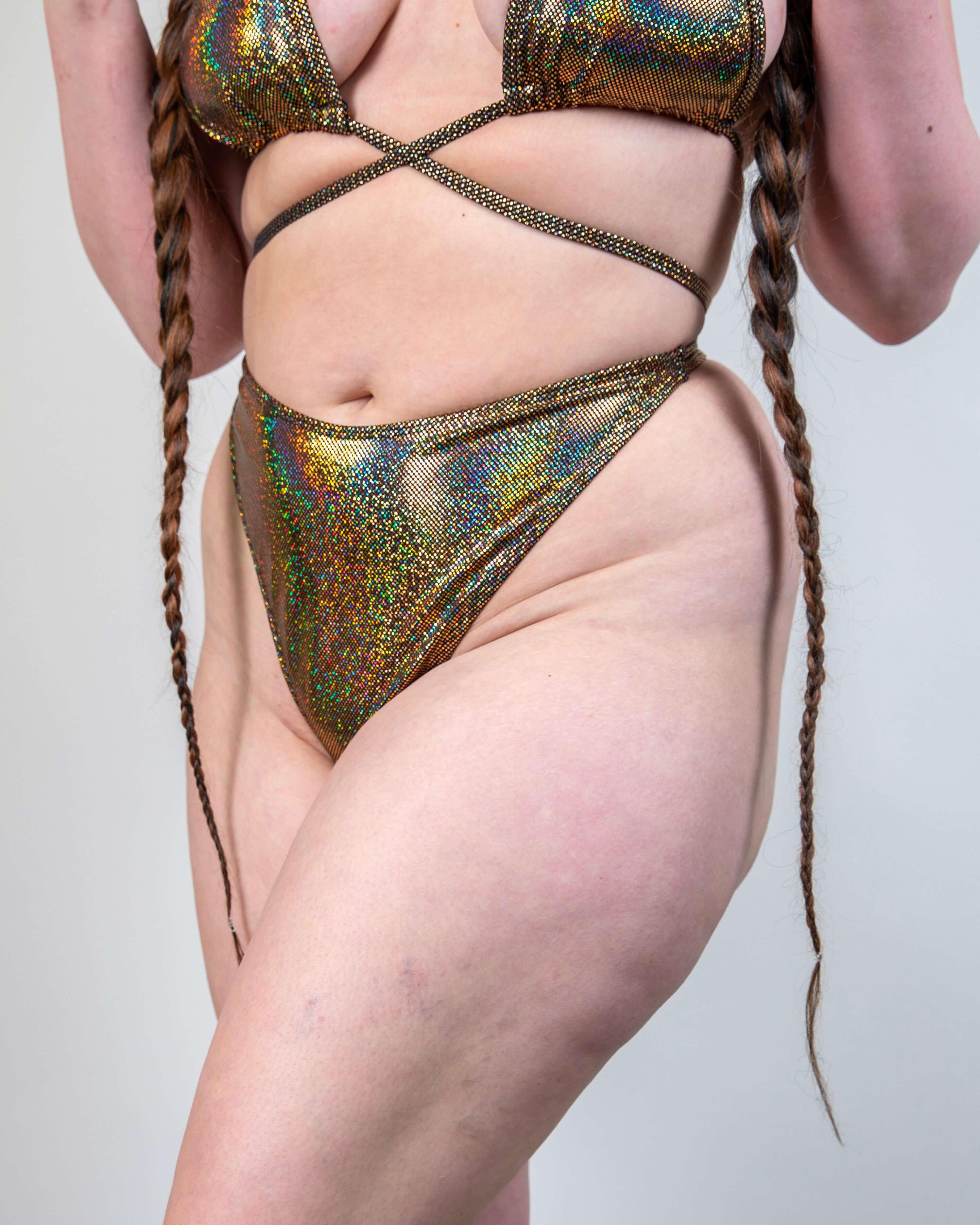 Starfire Retro Thong Bottoms featuring a sparkly gold design, perfect for rave outfits, beach and pool events.