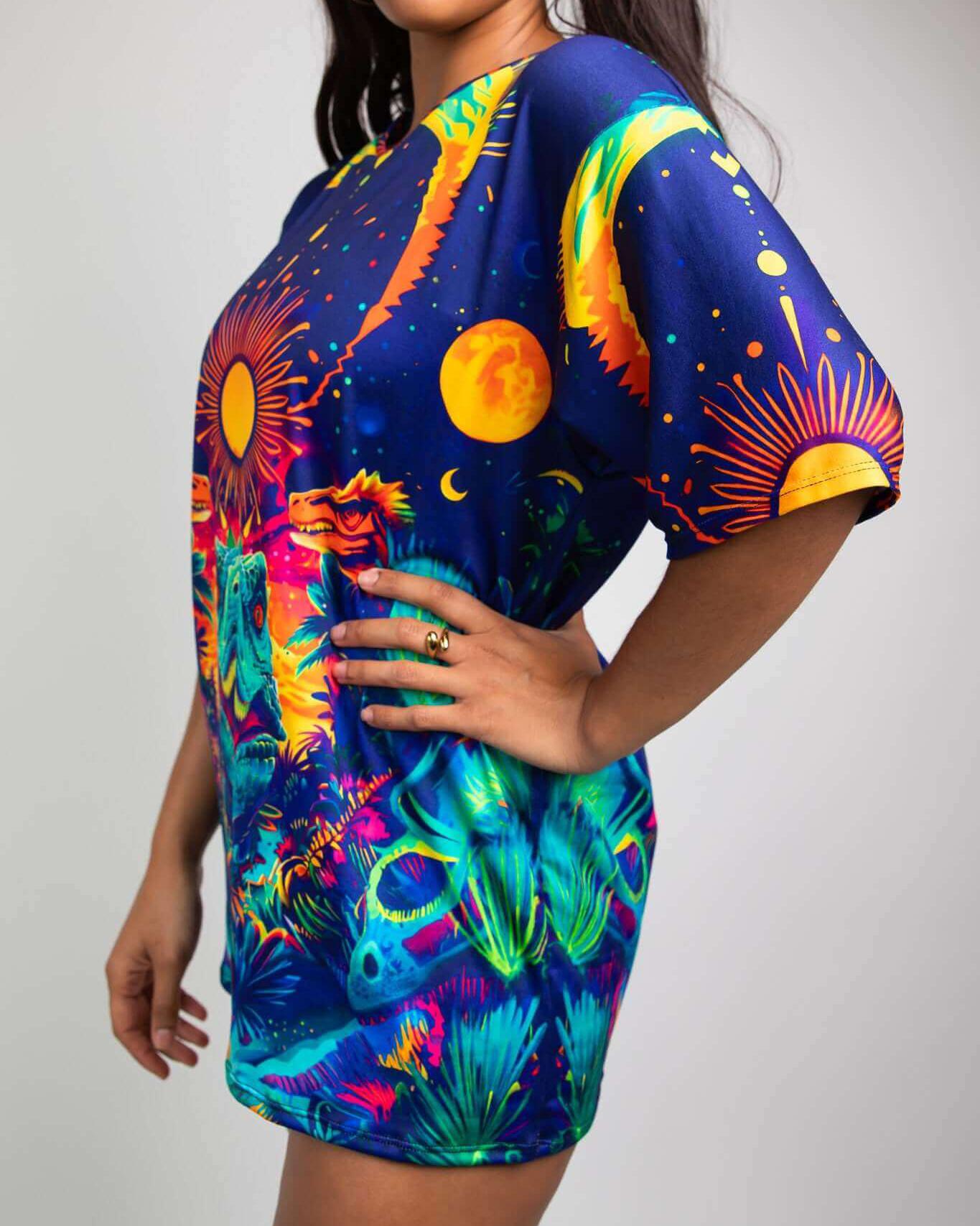 Model showcasing the Tyrant Oversized Softee tee, featuring a vivid celestial dinosaur design, perfect for rave outfits.