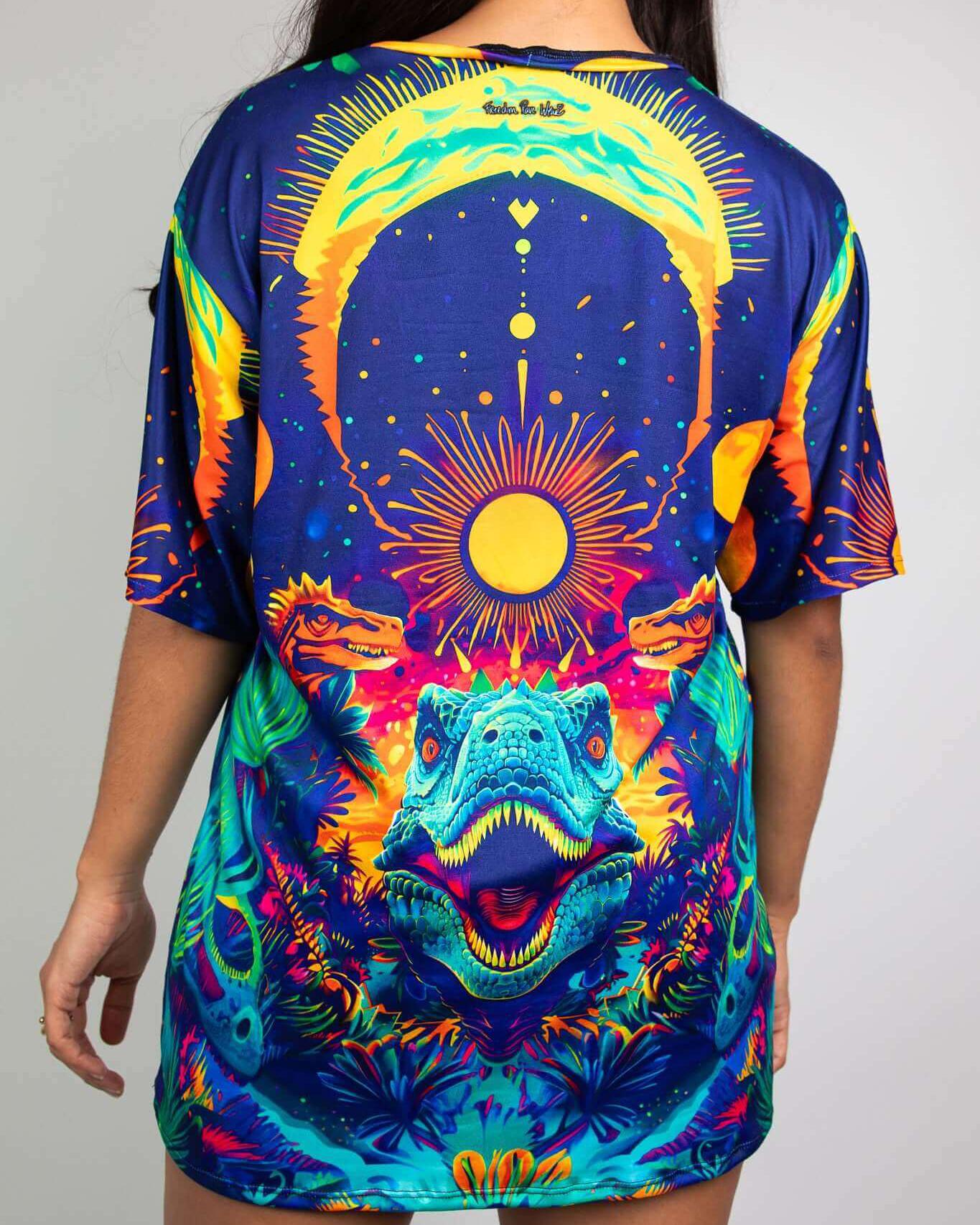 Model showcasing the Tyrant Oversized Softee with a vibrant celestial dinosaur design, perfect for rave outfits.