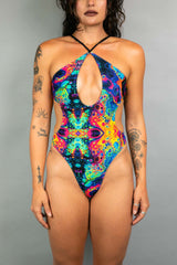 Vivid Halo Bodysuit with high-hip cut and keyhole design, perfect for rave outfits and vibrant party looks.