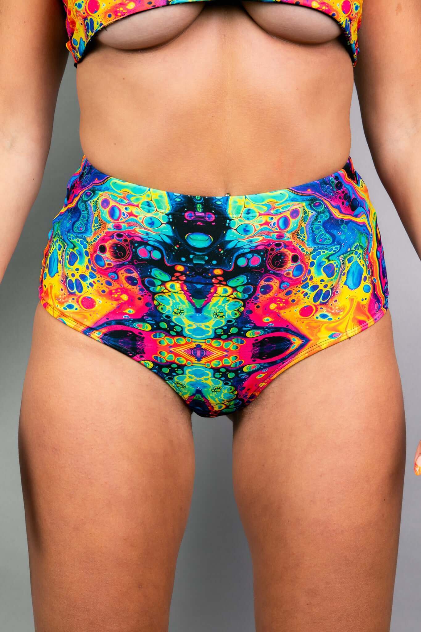 Front view of Freedom Rave Wear's swirl high-waisted shorts showcasing a vibrant, psychedelic print, designed for comfort and style at any rave.