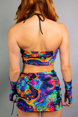 Vivid Ibiza Top showcasing a colorful trippy rainbow print, perfect for rave outfits. Comfort meets style for dancers.