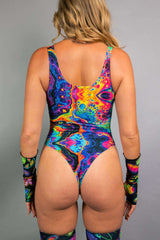  Back view of Freedom Rave Wear's psychedelic bodysuit, featuring a deep scoop back and vibrant, abstract print that adds boldness.