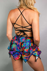 Reversible Vivid Shroomie Top with lace-up back, featuring vibrant rainbow and mushroom prints, perfect for rave outfits.