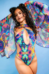 Model showcasing vibrant mesh bell sleeves with a colorful bodysuit, perfect for rave outfits.