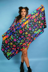 Model showcasing the Vivid Shroomie! Festival Scarf with vibrant floral and psychedelic patterns, perfect for rave outfits.