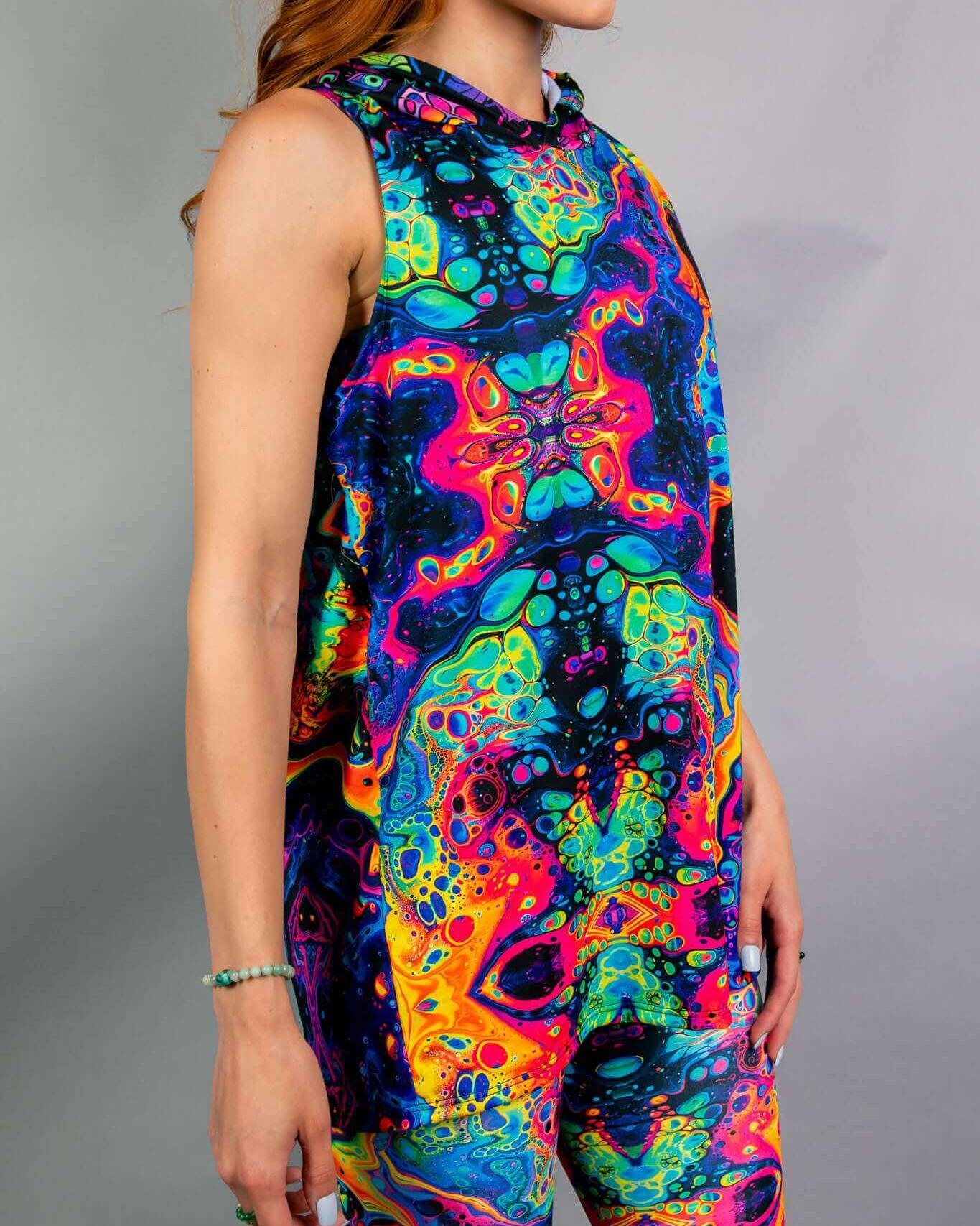 Vivid Shroomie unisex hooded tank top featuring vibrant, colorful patterns, perfect for rave outfits and stylish comfort.