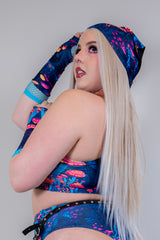 Side view of model wearing Wildwood Bandana, adjusting it while showcasing the vibrant festival-ready design.