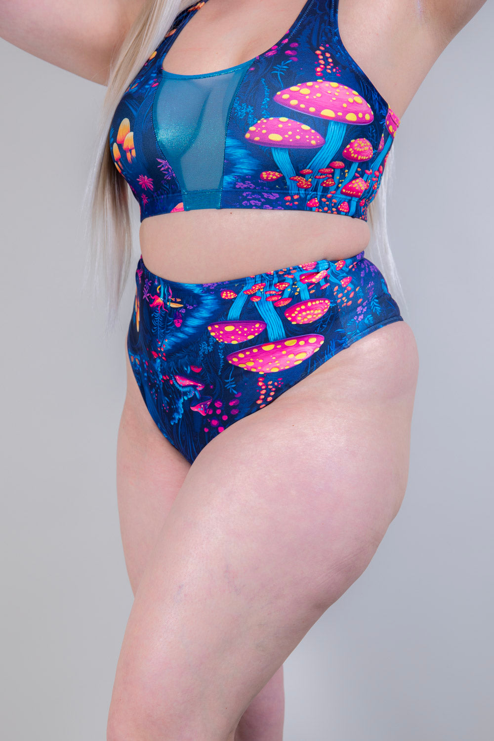 Close-up of Wildwood High Waisted Bikini Bottoms, highlighting the vibrant festival print and seamless waistband.