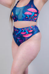 Close-up of Wildwood High Waisted Bikini Bottoms, highlighting the vibrant festival print and seamless waistband.