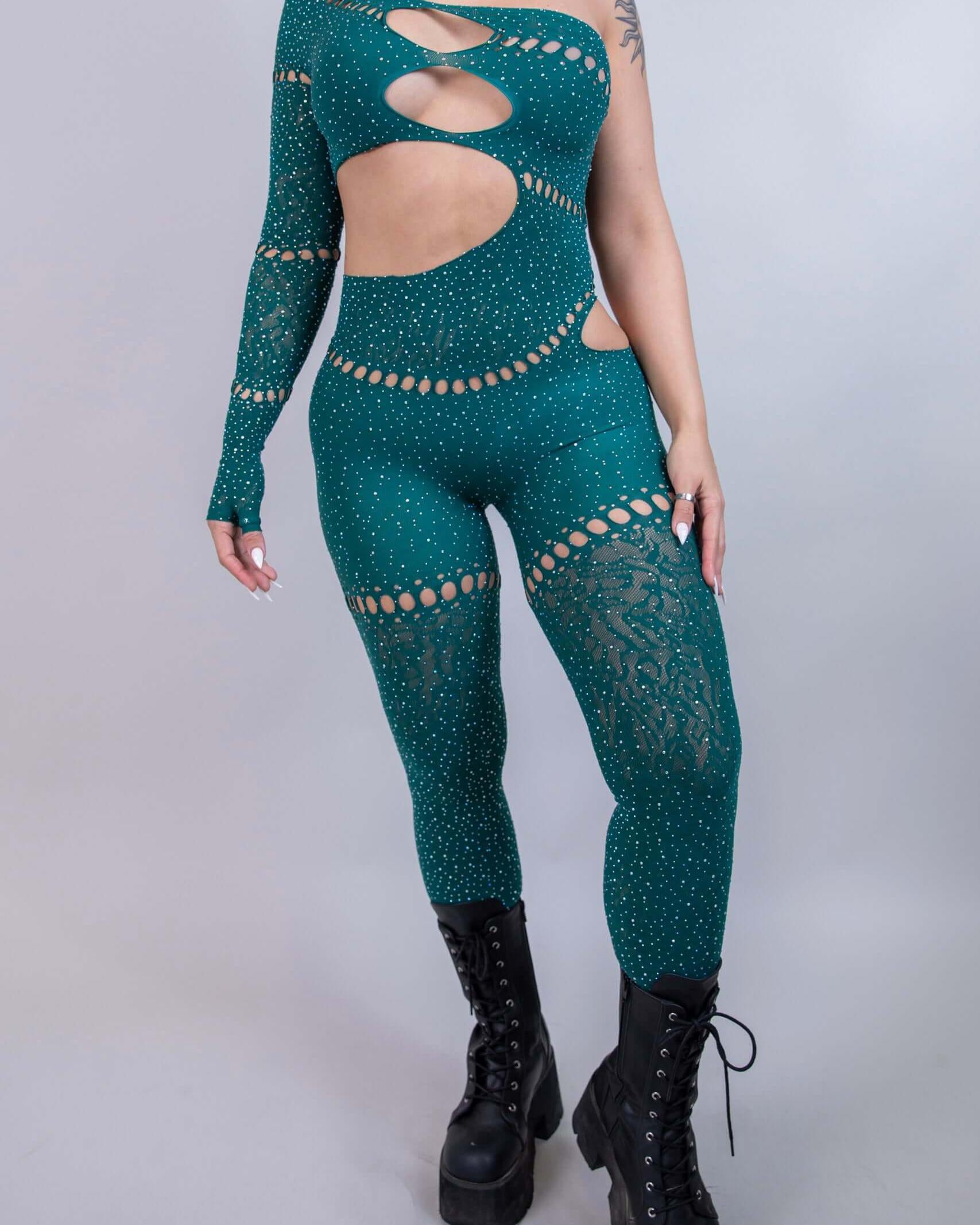 Emerald asymmetrical rhinestone jumpsuit with cutouts, perfect for rave outfits and bold fashion statements.