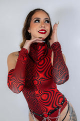 Model showcasing Amplitude Arm Sleeves in striking red and black design, perfect for rave outfits.