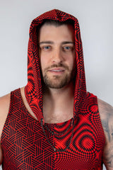 Man wearing Amplitude Assassin Hood in bold red and black geometric design, perfect for rave outfits.