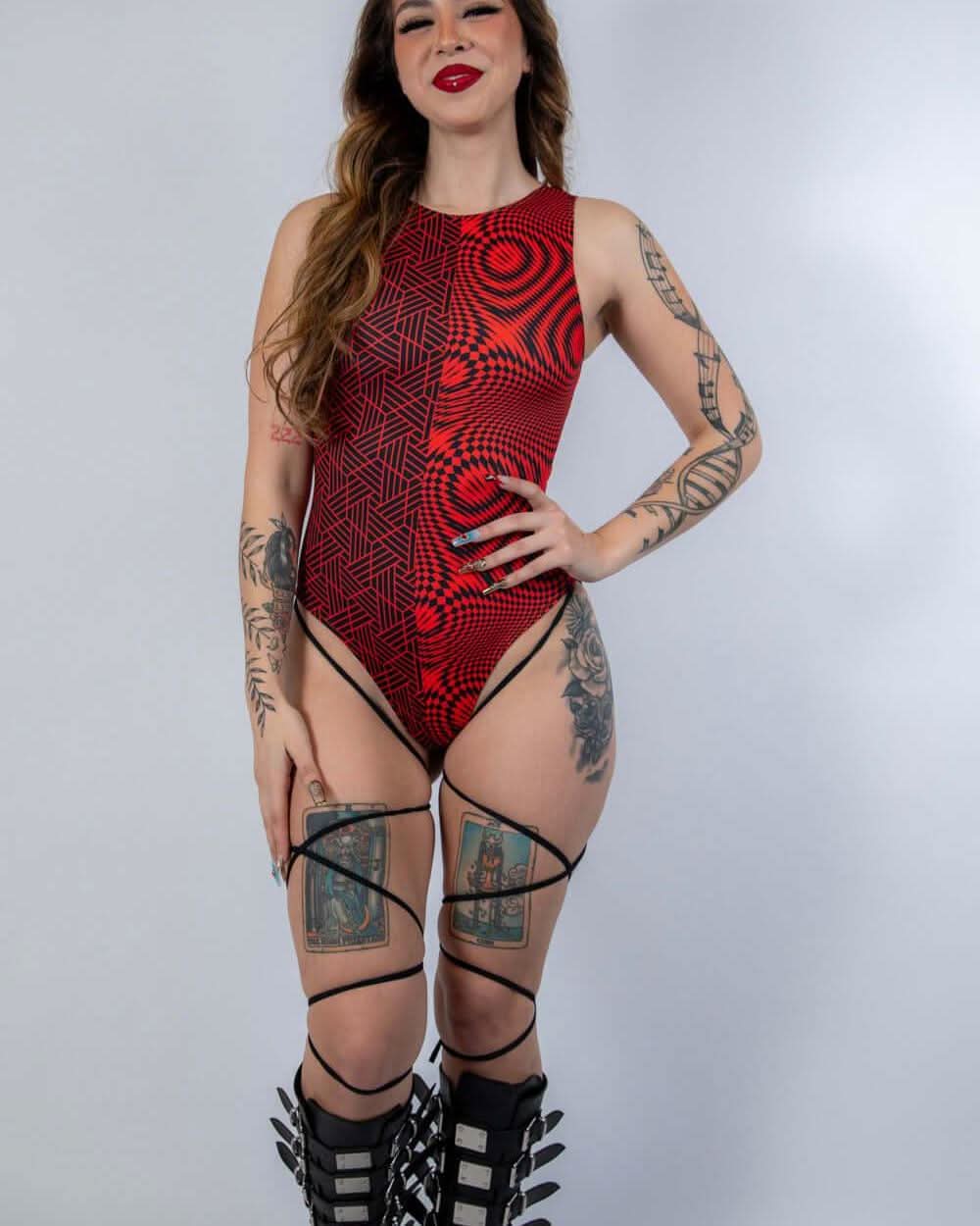Red and black Amplitude rave bodysuit with leg straps modeled front view festival outfit